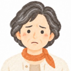 困った表情の年配の女性